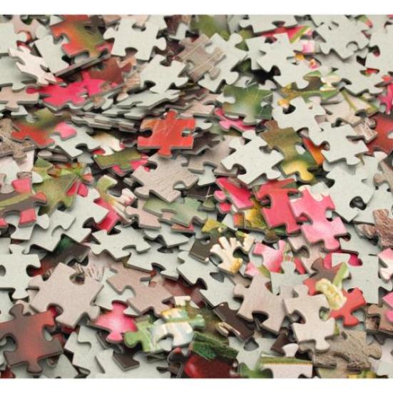 Fotografi af en masse puslespilsbrikker