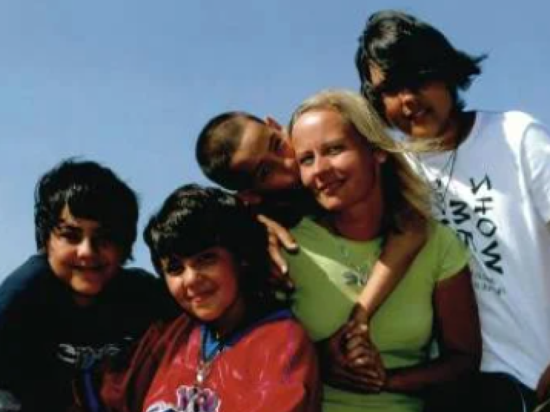 Bogforside: "Genforenet", Lindhardt & Ringhof